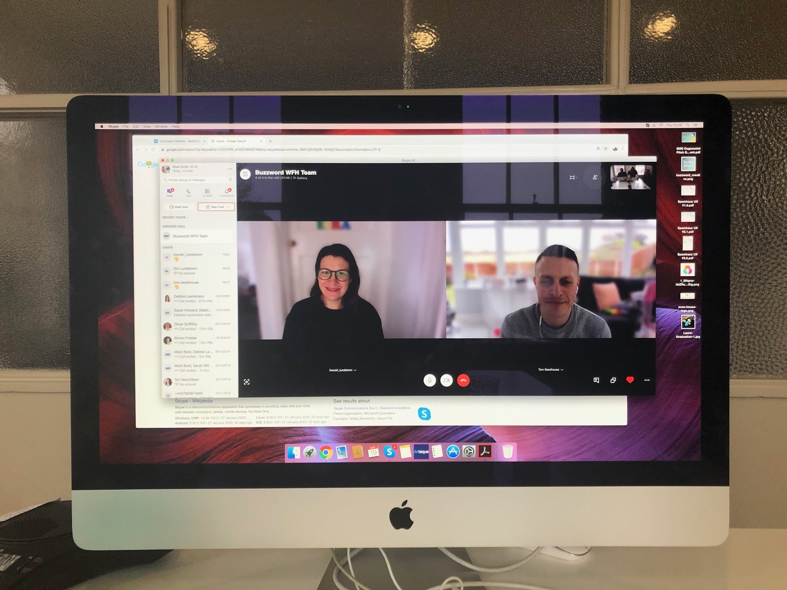 Photo of Mac Computer screen showing Skype call with 2 coworkers at Buzzword Creative